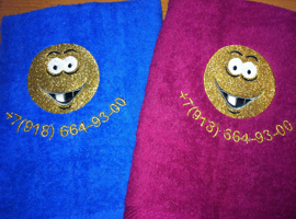 Вышивка на полотенце логотипа